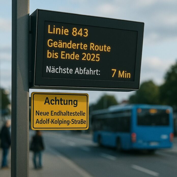 Brucker Blatt - Das Bild zeigt eine Haltestelle des öffentlichen Nahverkehrs. Im Vordergrund ist ein elektronisches Display zu sehen, das an einem grauen Metallpfosten befestigt ist. Das Display zeigt in gelber Schrift die Information 